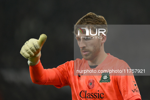 Daniel Grimshaw of Plymouth Argyle participates in the Sky Bet Championship match between Derby County and Plymouth Argyle at Pride Park in...