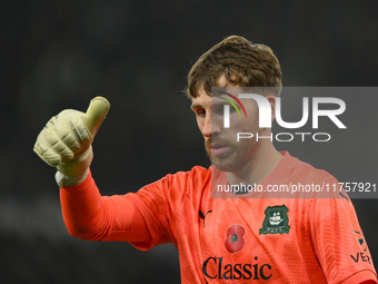 Daniel Grimshaw of Plymouth Argyle participates in the Sky Bet Championship match between Derby County and Plymouth Argyle at Pride Park in...