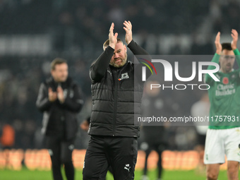 Wayne Rooney, manager of Plymouth Argyle, applauds his team's supporters during the Sky Bet Championship match between Derby County and Plym...