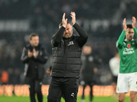 Wayne Rooney, manager of Plymouth Argyle, applauds his team's supporters during the Sky Bet Championship match between Derby County and Plym...