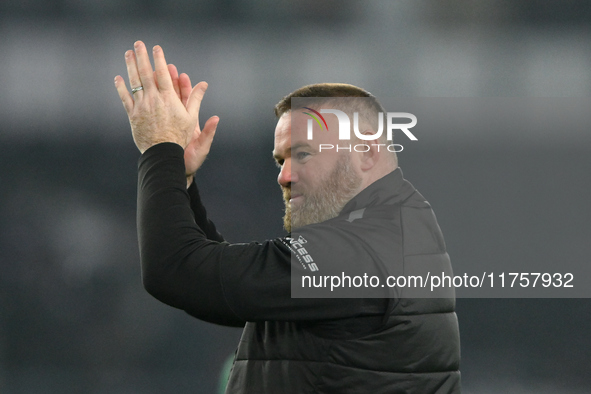 Wayne Rooney, manager of Plymouth Argyle, applauds the Derby supporters during the Sky Bet Championship match between Derby County and Plymo...