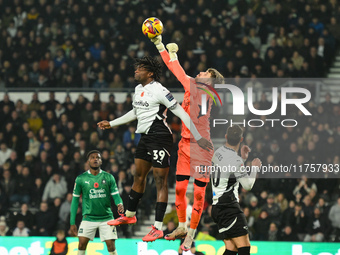 Daniel Grimshaw of Plymouth Argyle competes with Dajaune Brown of Derby County during the Sky Bet Championship match between Derby County an...