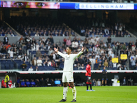 Jude Bellingham central midfield of Real Madrid and England celebrates after scoring his sides first goal during the La Liga match between R...