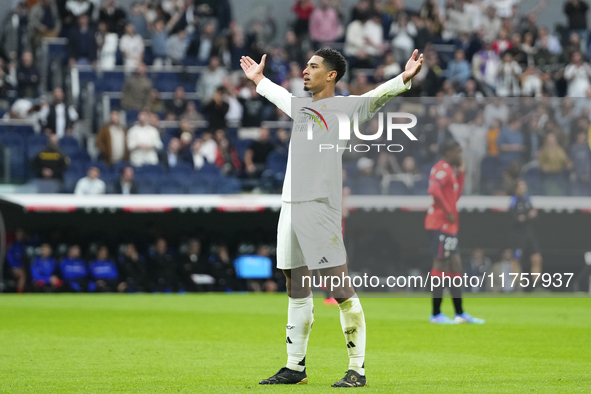 Jude Bellingham central midfield of Real Madrid and England celebrates after scoring his sides first goal during the La Liga match between R...