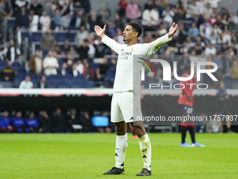 Jude Bellingham central midfield of Real Madrid and England celebrates after scoring his sides first goal during the La Liga match between R...