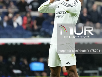 Jude Bellingham central midfield of Real Madrid and England celebrates after scoring his sides first goal during the La Liga match between R...