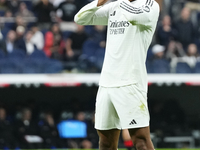 Jude Bellingham central midfield of Real Madrid and England celebrates after scoring his sides first goal during the La Liga match between R...