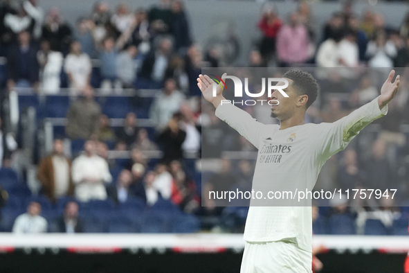 Jude Bellingham central midfield of Real Madrid and England celebrates after scoring his sides first goal during the La Liga match between R...