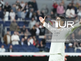 Jude Bellingham central midfield of Real Madrid and England celebrates after scoring his sides first goal during the La Liga match between R...