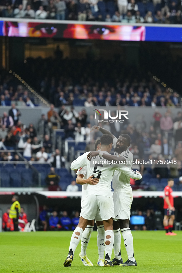 Jude Bellingham central midfield of Real Madrid and England celebrates after scoring his sides first goal during the La Liga match between R...