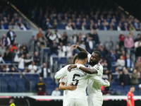 Jude Bellingham central midfield of Real Madrid and England celebrates after scoring his sides first goal during the La Liga match between R...