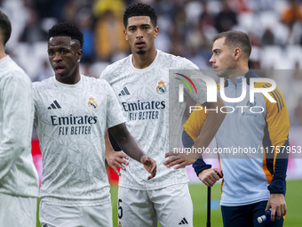 Jude Bellingham of Real Madrid CF (C) warms up during the La Liga EA Sports 2024/25 football match between Real Madrid CF and CA Osasuna at...