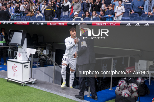 Raul Asencio of Real Madrid CF enters the field during the La Liga EA Sports 2024/25 football match between Real Madrid CF and CA Osasuna at...