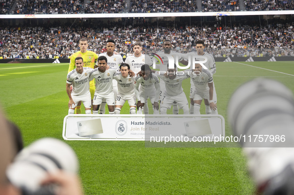 The Real Madrid CF team poses for the official photo during the La Liga EA Sports 2024/25 football match between Real Madrid CF and CA Osasu...