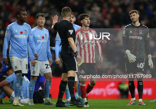 Sunderland's Trai Hume receives a yellow card during the Sky Bet Championship match between Sunderland and Coventry City at the Stadium Of L...