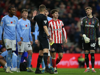 Sunderland's Trai Hume receives a yellow card during the Sky Bet Championship match between Sunderland and Coventry City at the Stadium Of L...