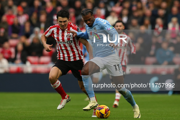 Coventry City's Haji Wright holds off Sunderland's Luke O'Nien during the Sky Bet Championship match between Sunderland and Coventry City at...