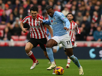 Coventry City's Haji Wright holds off Sunderland's Luke O'Nien during the Sky Bet Championship match between Sunderland and Coventry City at...