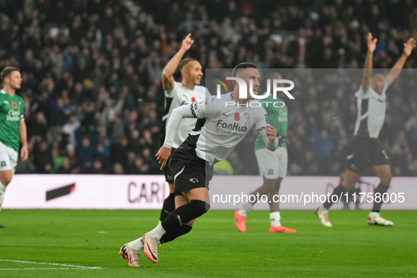 Jerry Yates of Derby County celebrates after scoring a goal to make it 1-0 during the Sky Bet Championship match between Derby County and Pl...