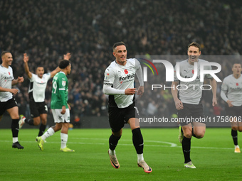 Jerry Yates of Derby County celebrates after scoring a goal to make it 1-0 during the Sky Bet Championship match between Derby County and Pl...