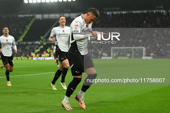 Jerry Yates of Derby County celebrates after scoring a goal to make it 1-0 during the Sky Bet Championship match between Derby County and Pl...