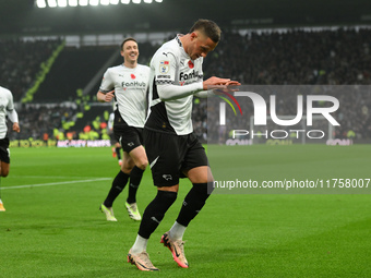 Jerry Yates of Derby County celebrates after scoring a goal to make it 1-0 during the Sky Bet Championship match between Derby County and Pl...