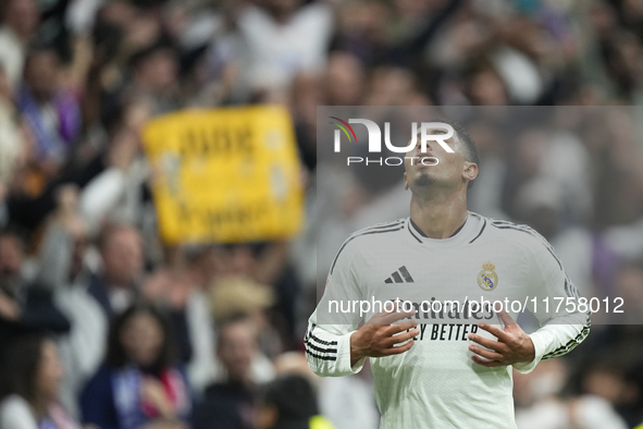 Jude Bellingham central midfield of Real Madrid and England celebrates after scoring his sides first goal during the La Liga match between R...