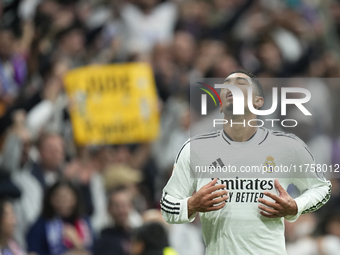 Jude Bellingham central midfield of Real Madrid and England celebrates after scoring his sides first goal during the La Liga match between R...