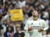 Jude Bellingham central midfield of Real Madrid and England celebrates after scoring his sides first goal during the La Liga match between R...