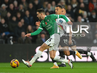 Julio Pleguezuelo of Plymouth Argyle is under pressure from Kayden Jackson of Derby County during the Sky Bet Championship match between Der...