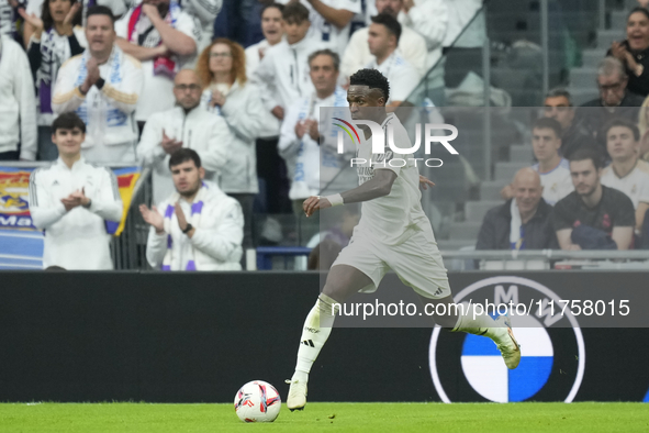 Vinicius Junior left winger of Real Madrid and Brazil during the La Liga match between Real Madrid CF and CA Osasuna at Estadio Santiago Ber...