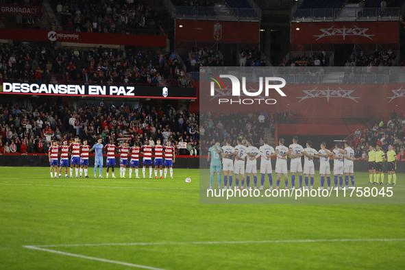 Players honor Valencia inhabitants after the floods due to a DANA storm on October 29 during the LaLiga Hypermotion match between Granada CF...