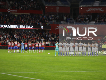 Players honor Valencia inhabitants after the floods due to a DANA storm on October 29 during the LaLiga Hypermotion match between Granada CF...