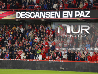 Fans honor Valencia inhabitants after the floods due to a DANA storm on October 29 during the LaLiga Hypermotion match between Granada CF an...