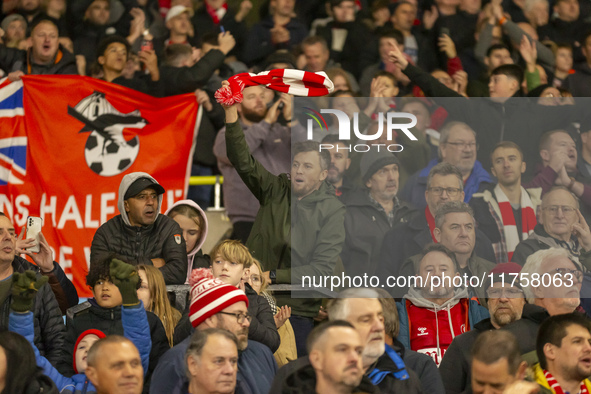 Bristol City supporters celebrate after the Sky Bet Championship match between Norwich City and Bristol City at Carrow Road in Norwich, Engl...