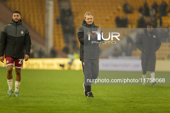 Bristol City Manager, Liam Manning, applauds their supporters after the Sky Bet Championship match between Norwich City and Bristol City at...