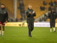 Bristol City Manager, Liam Manning, applauds their supporters after the Sky Bet Championship match between Norwich City and Bristol City at...