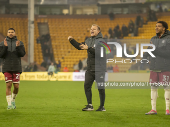 Bristol City Manager, Liam Manning, celebrates their win after the Sky Bet Championship match between Norwich City and Bristol City at Carro...