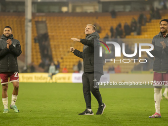 Bristol City Manager, Liam Manning, celebrates their win after the Sky Bet Championship match between Norwich City and Bristol City at Carro...