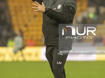 Bristol City Manager, Liam Manning, celebrates their win after the Sky Bet Championship match between Norwich City and Bristol City at Carro...