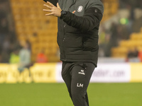 Bristol City Manager, Liam Manning, celebrates their win after the Sky Bet Championship match between Norwich City and Bristol City at Carro...