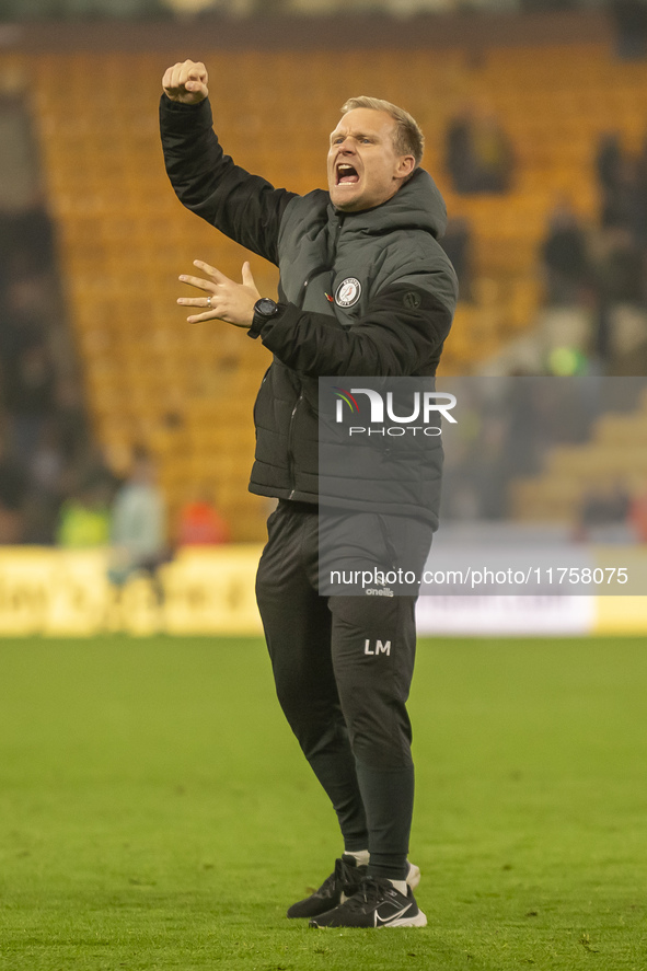 Bristol City Manager, Liam Manning, celebrates their win after the Sky Bet Championship match between Norwich City and Bristol City at Carro...