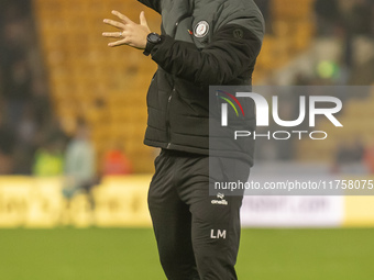 Bristol City Manager, Liam Manning, celebrates their win after the Sky Bet Championship match between Norwich City and Bristol City at Carro...