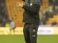 Bristol City Manager, Liam Manning, celebrates their win after the Sky Bet Championship match between Norwich City and Bristol City at Carro...