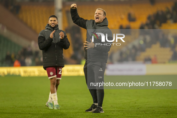 Bristol City Manager, Liam Manning, celebrates their win after the Sky Bet Championship match between Norwich City and Bristol City at Carro...