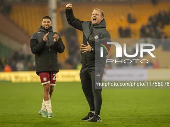 Bristol City Manager, Liam Manning, celebrates their win after the Sky Bet Championship match between Norwich City and Bristol City at Carro...