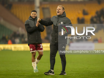 Bristol City Manager, Liam Manning, celebrates their win after the Sky Bet Championship match between Norwich City and Bristol City at Carro...