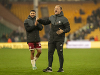 Bristol City Manager, Liam Manning, celebrates their win after the Sky Bet Championship match between Norwich City and Bristol City at Carro...