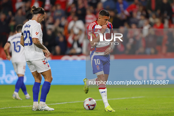 Myrto Uzuni of Granada CF scores the first goal of the match from the penalty during the LaLiga Hypermotion match between Granada CF and CD...