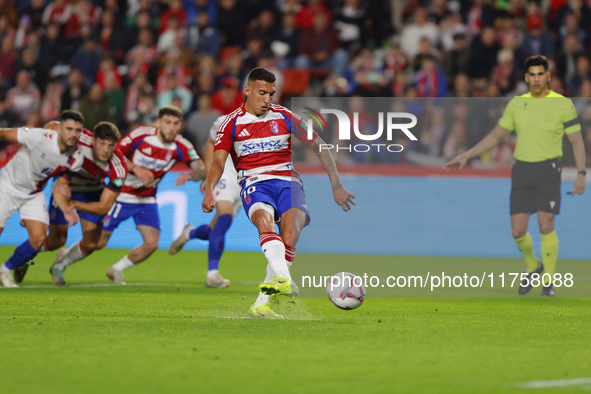 Myrto Uzuni of Granada CF scores the first goal of the match from the penalty during the LaLiga Hypermotion match between Granada CF and CD...